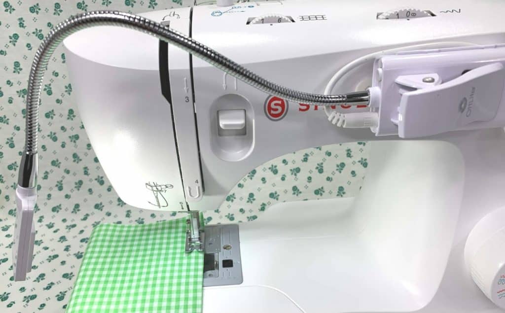 Use an attachable sewing machine light so you can see the guide your using to sew a straight line Use an attachable sewing machine light so you can see the guide your using to sew a straight line