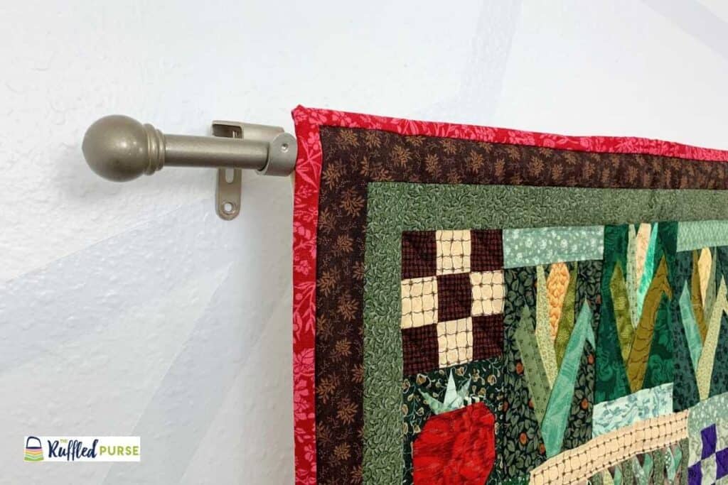 How To Hang A Quilt On The Wall The Ruffled Purse 