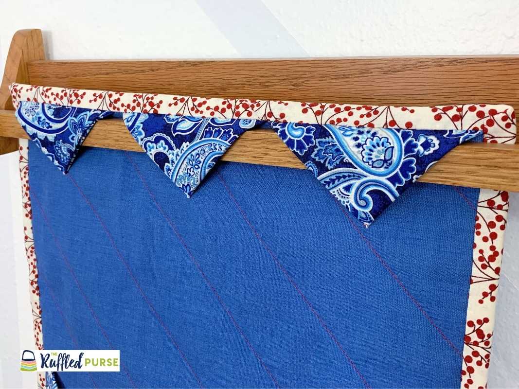 Hang Quilts with Triangles - The Ruffled Purse®