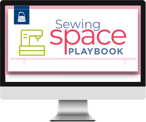 Computer with Sewing Space Playbook logo featured on the screen