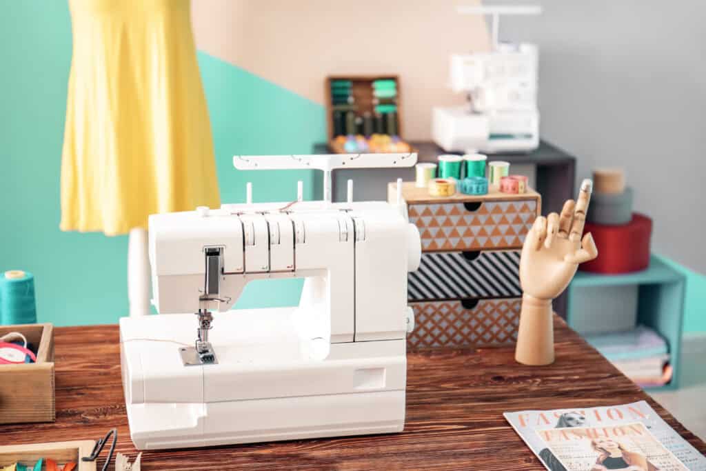 a seger setting on a table in an organized sewing space